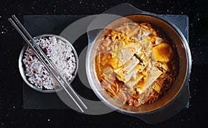 Traditional Korea food, Kimchi Jjigae soup with rice photo