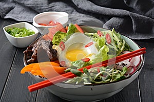 Traditional Korean dish- Bibimbap, rice with egg, beef