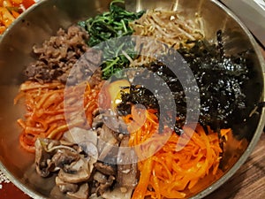 Traditional Korean dish- bibimbap: rice with vegetables and beef