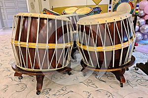 Traditional Korean floor drums and other percussion instruments are prepared for the performance