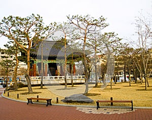 Traditional korean pagoda with bell in central park