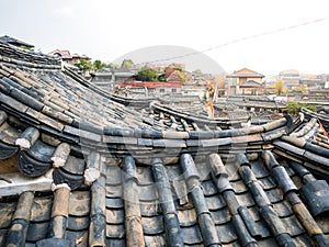 Traditional Korean tile roof hanok seoul ,south korea.Sunshine lighting flare.