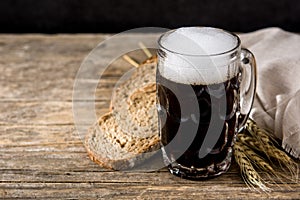 Traditional kvass beer mug with rye bread