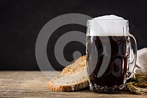 Traditional kvass beer mug with rye bread