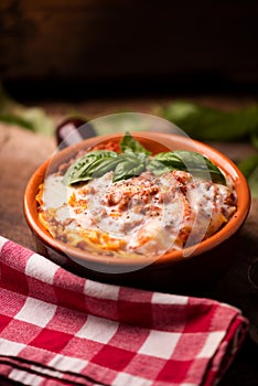 Traditional lasagne in a casserole dish