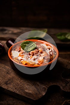 Traditional lasagne in a casserole dish