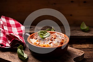 Traditional lasagne in a casserole dish