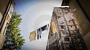 A laundry stretched out on the street drying in the midday sun. photo