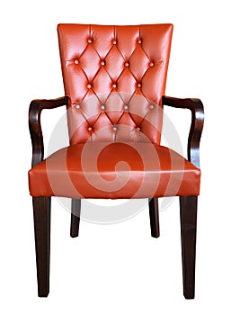 A traditional leather armchair upholstered