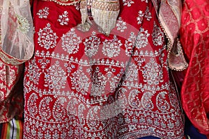 Traditional Lehenga Design Ethnic wear of indian tradition with intricate aari work in red color