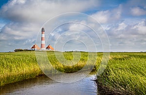 Traditional lighthouse with beautiful landscape at North Sea