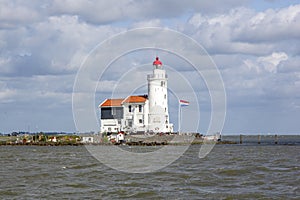 Traditional lighthouse `Het Paard van Marken` in Marken the Netherlands