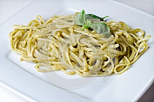 Traditional linguini with basil pesto