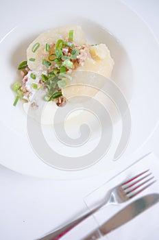 Traditional Lithuanian dish meal cuisine - stuffed meat potato dumpling (Cepelinai,didzkukuliai),Lithuanian national dish, curd