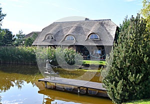 Traditional Lithuanian manor with garden pond