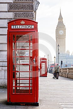 Traditional London red phone box and Big ben in early morning