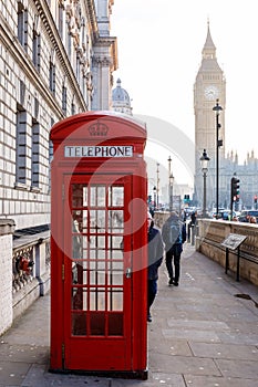 Traditional London red phone box and Big ben in early morning