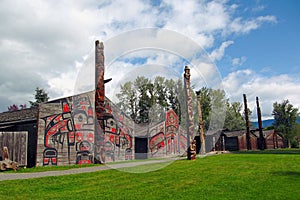 K`san Village in Hazelton with Gitsan Traditional Longhouses and Totem Poles, British Columbia, Canada photo