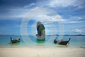 Traditional longtail boat and Poda island, Thailand