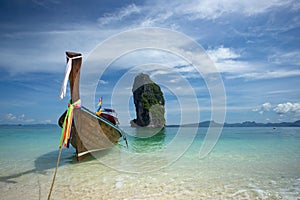 Traditional longtail boat and Poda island, Thailand