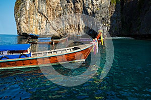 Traditional longtail boat on the way to famous Maya Bay beach in Koh Phi Phi Island, Thailand