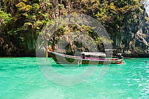 Traditional longtail boats in the famous Maya bay of Phi-phi Leh island