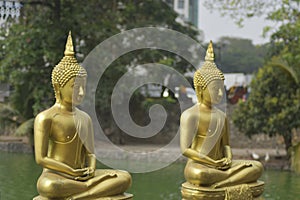 Traditional lord buddha two statues with Nice river backgrounding Sri Lanka