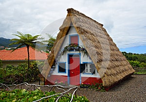 Traditional Madeira building with thatched roof. photo