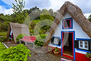 Traditional Madeira house in Santana Portugal photo