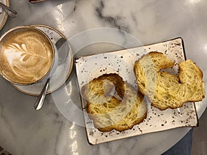 Traditional Madrid breakfast with coffee with milk