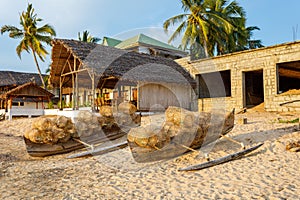 Traditional malagasy fishing boat with trap on beach