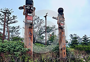 Traditional male and female Korean totem pole at the Northern Sky Skyway in South Korea.