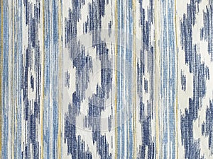 Traditional Mallorcan fabric texture with a pattern in the shape of blue and white tongues. Cushion fabric background made with