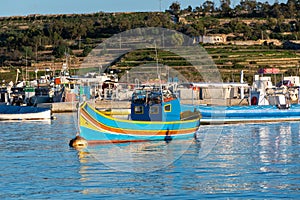 Traditional Maltese fishing boat - Luzzu photo