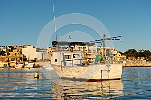 Fishing boat, Marsaxlokk harbor, Malta island photo