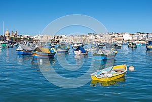 Traditional Maltese fishing boats - Luzzu photo
