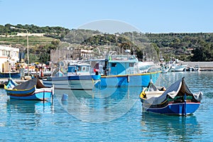 Traditional Maltese fishing boats - Luzzu photo