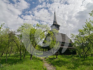 Traditional Maramures wooden church. UNESCO world heritage. Barsana, Romania