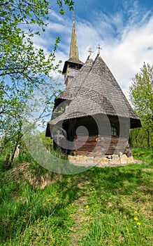 Traditional Maramures wooden church. UNESCO world heritage. Barsana, Romania