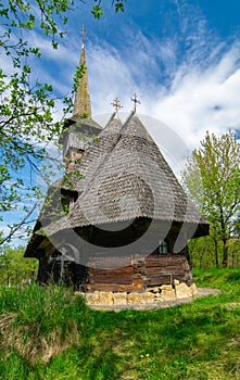 Traditional Maramures wooden church. UNESCO world heritage. Barsana, Romania