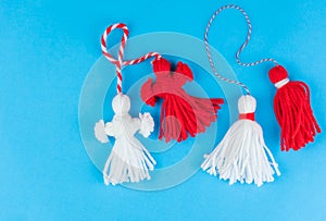 Traditional Martisor - symbol of holiday 1 March, Martenitsa, Baba Marta, beginning of spring and seasons changing in Romania, photo