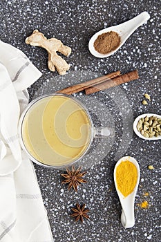 Traditional masala tea, healthy indian drink with spices star anise, cinnamon, turmeric flat lay