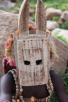 Traditional mask dancer in Dogon Village Mali