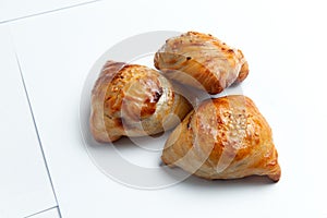 Traditional meat pies. on a white background