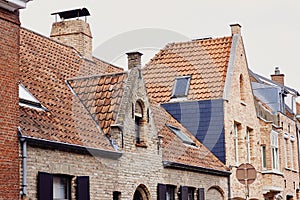Traditional medieval architecture, brick houses with red tiled roofs