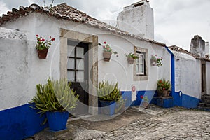 Traditional Medieval Street in Obidos, Portugal photo