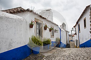 Traditional Medieval Street in Obidos, Portugal photo