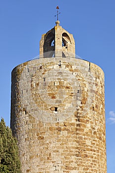 Traditional medieval village of Pals. Tower of hours. Girona, Spain photo