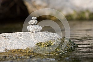 Traditional meditation zen stones design on a river