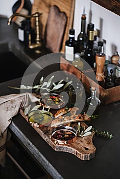 Traditional Mediterranean meze appetizers platter over kitchen counter